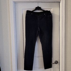 Dark blue jeans, with a 3.5 " spandex waist band. Size 16